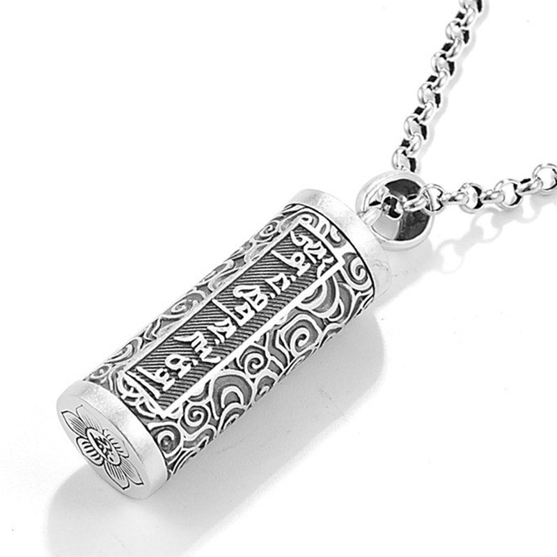 Om Mani Padme Hum Silver Protection Necklace – Horizontal silver tube pendant with lotus flower end cap, Tibetan script mantra and cloud scrollwork engraving on rolo chain against white background