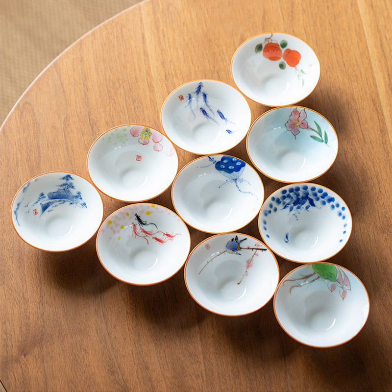 Mandala Koi Teacup – Side angle showing koi fish swimming near lotus, hand-painted ceramic