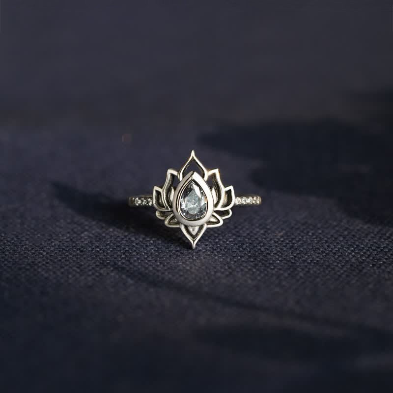 Sterling Silver Lotus Ring – Icy zircon lotus on dark navy fabric, bohemian silver ring