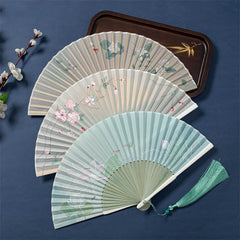 Lotus Begonia Jasmine Handheld Bamboo Folding Fan - three fans lotus begonia jasmine designs overlaid on navy