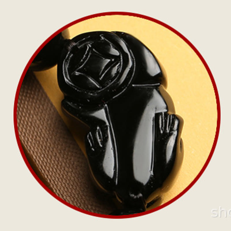 Gold Sheen Obsidian PiXiu Bracelet – Circular close-up of glossy PiXiu back detail, black stone