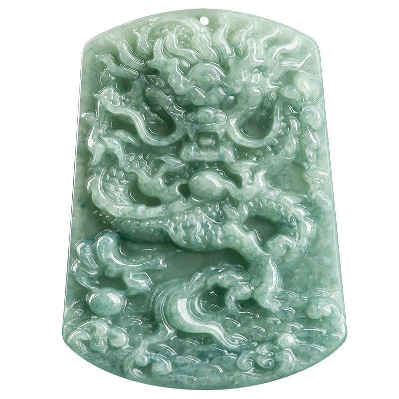 Natural Jade Dragon Pendant – White background studio shot of detailed jade dragon carving, Clean artistry