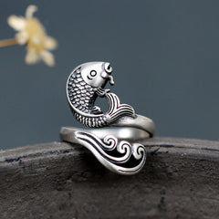 925 Sterling Silver Koi Ring – top view of polished silver koi swimming through water ripple band, wealth luck jewelry