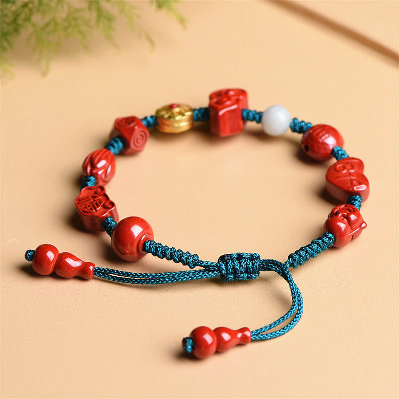 Cinnabar Laughing Buddha Bracelet – side view gourd shape and bead spacing, spiritual accessory design