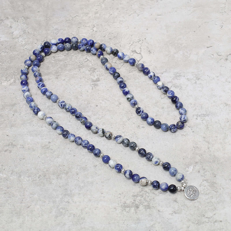 Blue Aventurine Lotus Peace Bracelet – full length looped mala necklace with silver lotus disc pendant on gray marble background