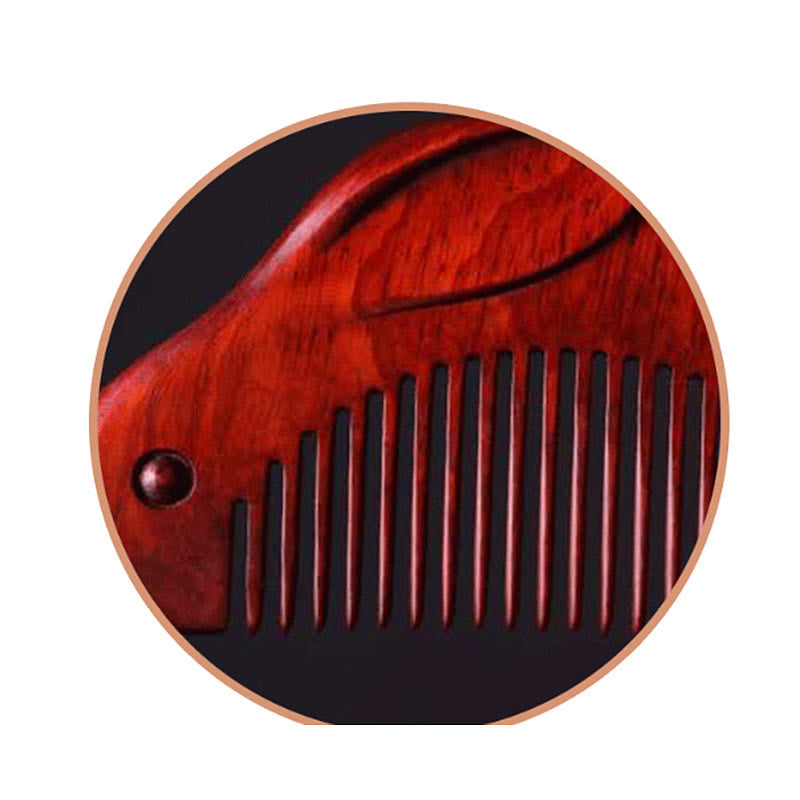 Circular close-up of bunny comb head and fine wooden teeth