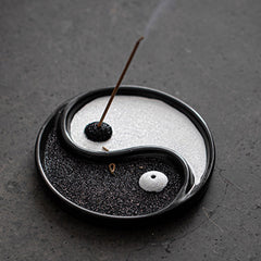 Yin Yang Incense Holder – Black and white sand dish with burning incense smoke, Meditative