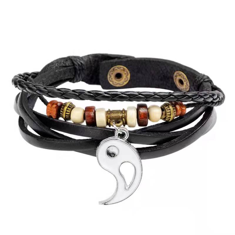 Copper Yin Yang Balance Bracelet - Clean white studio photo of beaded leather bracelet with yin-yang