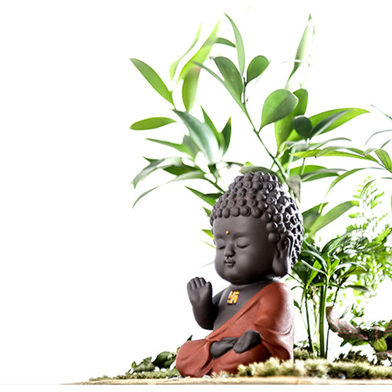 Small Buddha Purple Clay Decoration – nestled among moss and live bamboo stems, low angle zen garden setting, natural harmony