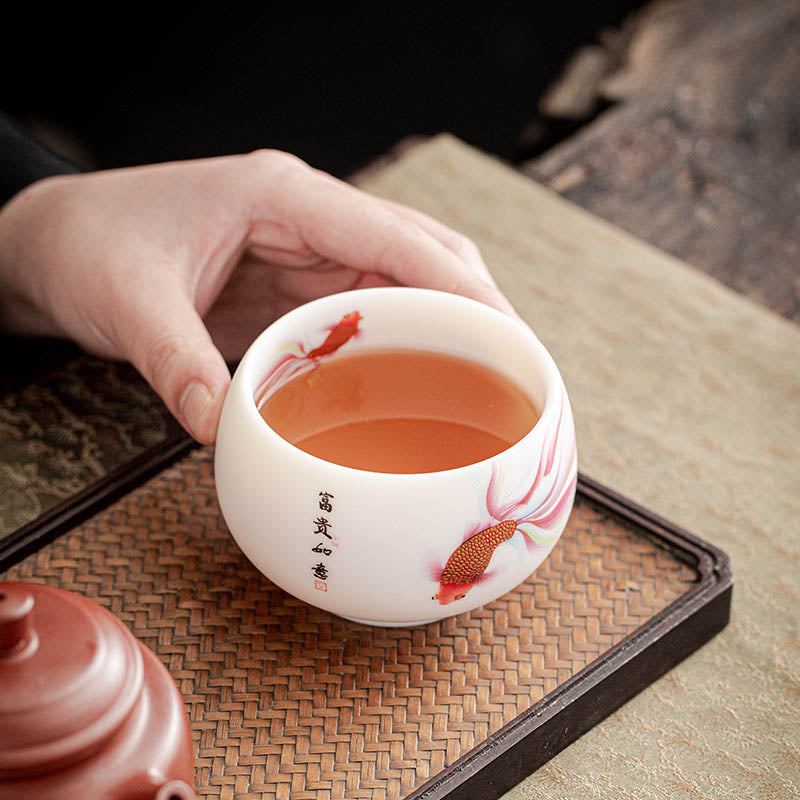 Koi Fish White Teacup - stacked set of cups displaying consistent koi pattern, tea set