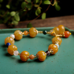Golden Silk Jade Bracelet – golden jade pumpkin beads green tray mixed accent stones