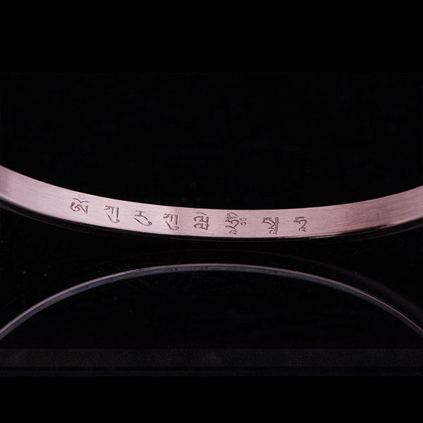 Om Mani Padme Hum Engraved Bracelet – inner curve showing Tibetan script engraving detail, authentic bracelet