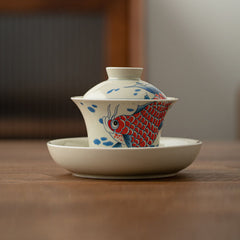 Koi Sancai Teacup – side profile with three-color glaze and koi, gaiwan 130ml