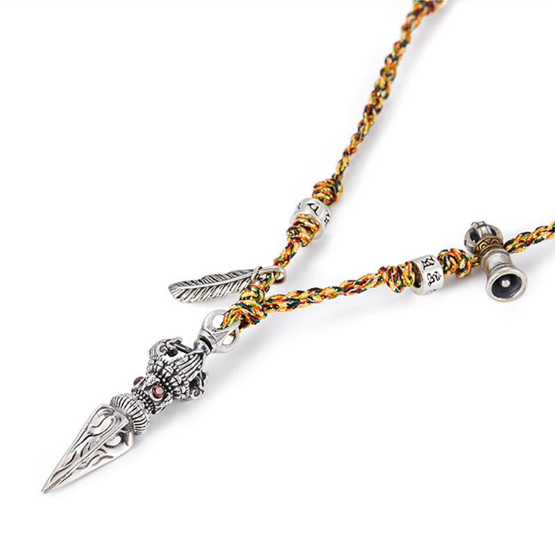 Dorje Vajra Pendant – Diagonal close-up of vajra with red inlays and feather charm, silver necklace