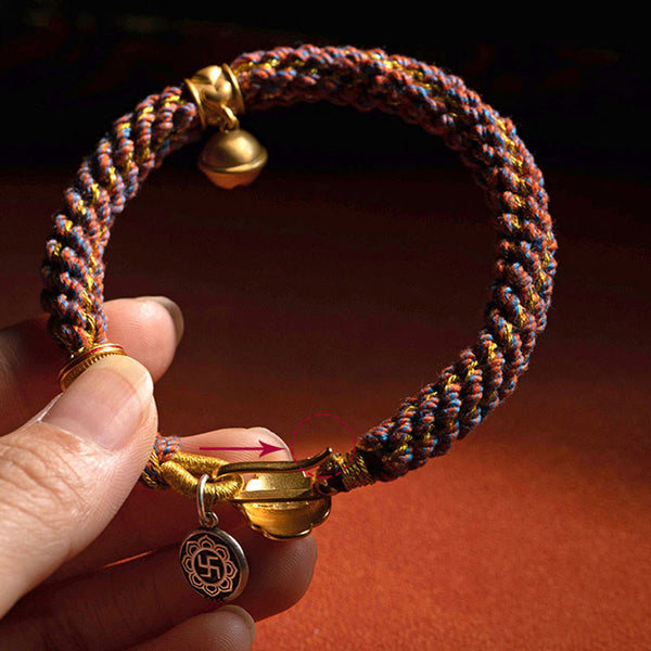 Om Mani Padme Hum Braided Bracelet – Adjustable clasp detail with Buddhist wan symbol charm on colorful woven cord