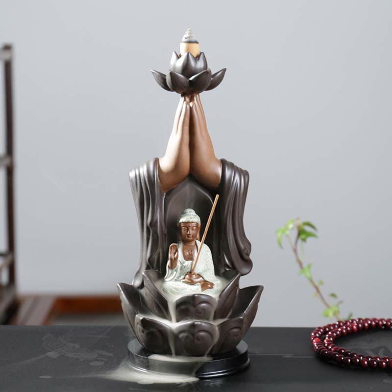 Buddha Lotus Incense Burner – Smoke cascading over lotus base with prayer beads, Mindful space