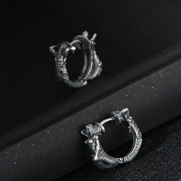 Sterling Silver Dragon Hoop Earrings – hinged dragon huggie hoops on velvet display rods, antiqued silver finish, bold