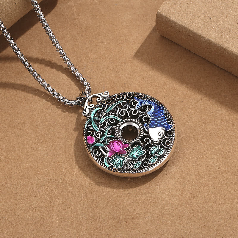 Koi Lotus Peace Buckle - side angle showing lotus relief and koi scale detail, luck amulet