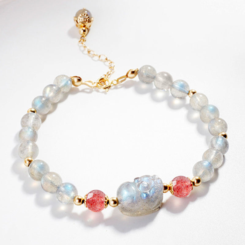 Moonstone PiXiu Bracelet – Full bracelet flat lay on white with PiXiu centerpiece, healing gift