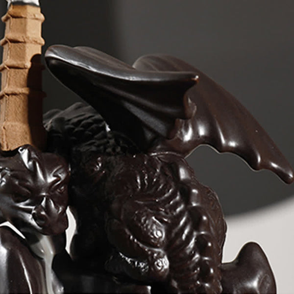 Nordic Dragon Backflow Incense Burner close-up of dragon wing and scale texture, dark glazed ceramic, incense burner detail