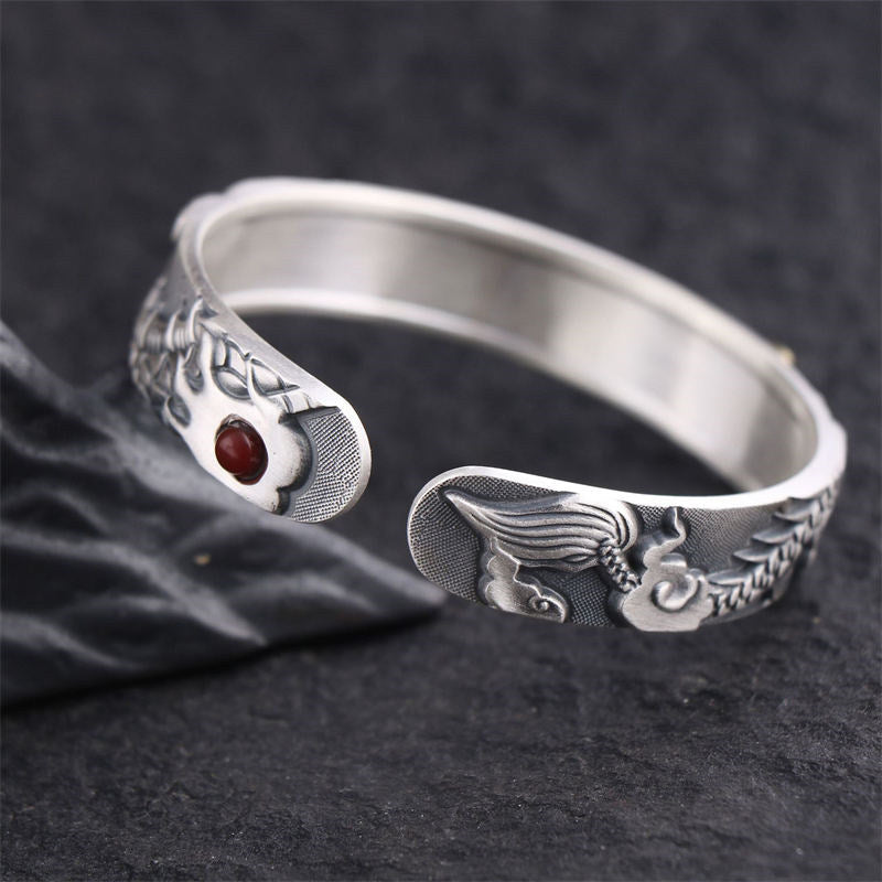 Silver Dragon Phoenix Cuff – Red cabochon stone between mythological terminals, Prosperity