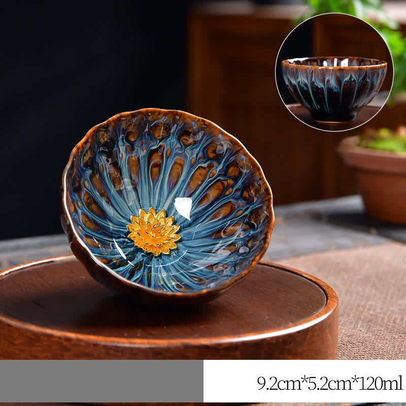 Lotus Peacock Dragon Phoenix Koi Fish Ceramic Teacup – held in hand showing size and grip, Chinese tea cup