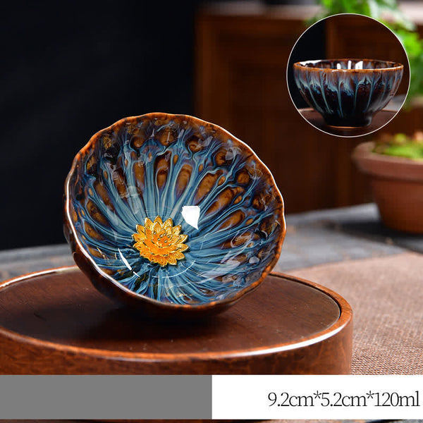 Lotus Peacock Dragon Phoenix Koi Fish Ceramic Teacup – held in hand showing size and grip, Chinese tea cup
