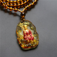 Ksitigarbha Buddha Liuli Crystal Necklace – Handcrafted liuli glass Buddha charm with warm golden hue, meditation accessory