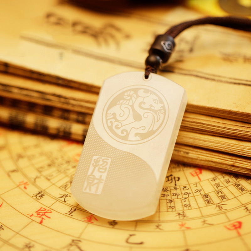 White Jade PiXiu Pendant – White jade pendant with PiXiu design on traditional Chinese compass chart