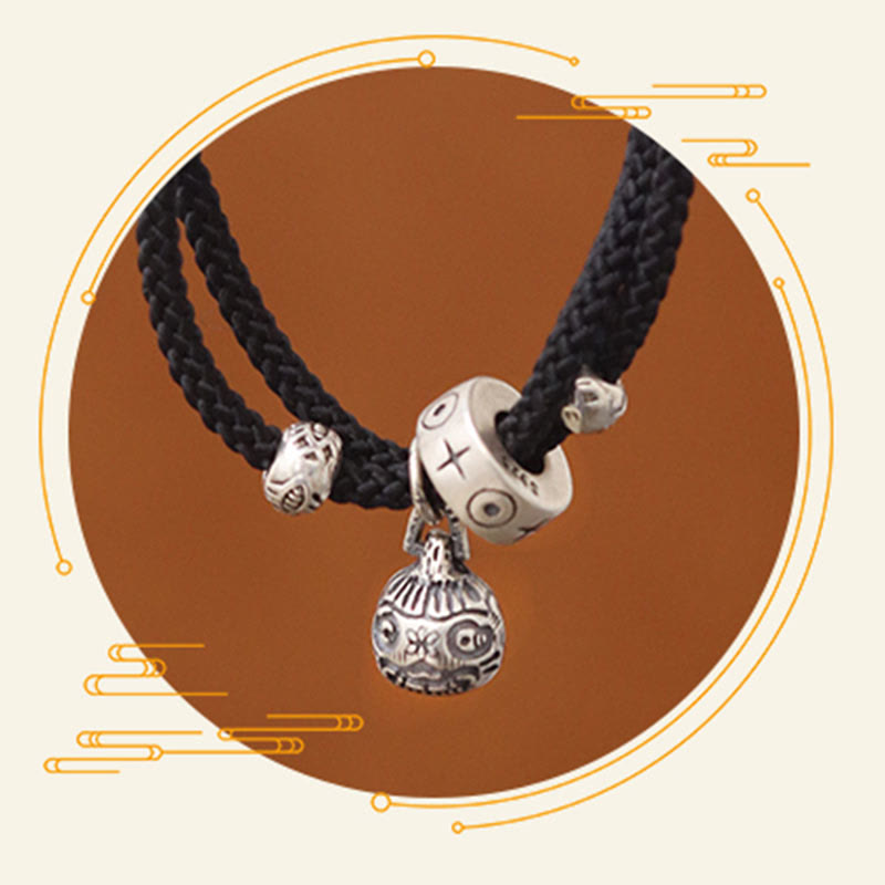 Silver Gold Koi Pixiu Bracelet - side wrist view, silver gold charms on braided cord