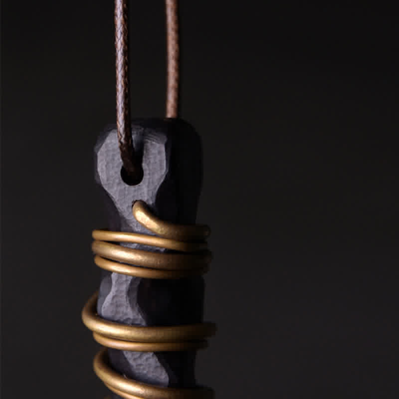 Ebony Wood Pendant Necklace – Wire wrapped stone close-up profile, artisan crystal jewelry