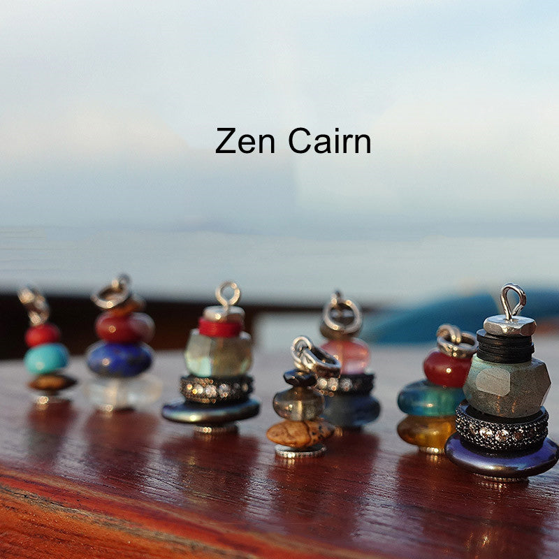 Zen Cairn Crystal Pendant – colorful stacked stone pendants with turquoise red amber beads on dark background, crystal jew...