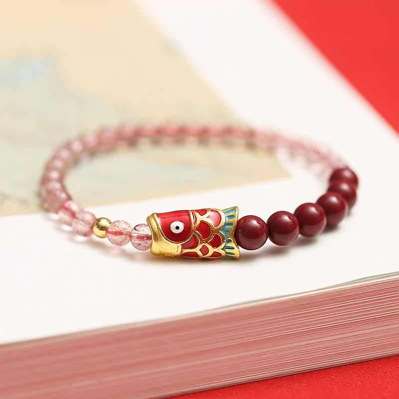 Strawberry Quartz Koi Bracelet – side angle view revealing bead depth and polishing quality