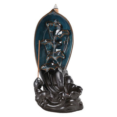 Backflow Incense Burner – Turquoise ceramic leaf on dark mat, Serene