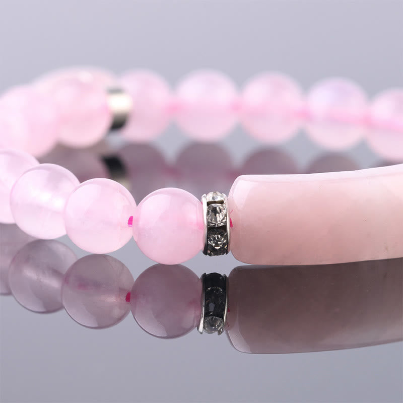 Natural Multi-Stone Love Heart Healing Bracelet - Rose quartz bracelet close-up showing milky pink beads, crystal-accented silver spacers, and frosted bar centerpiece
