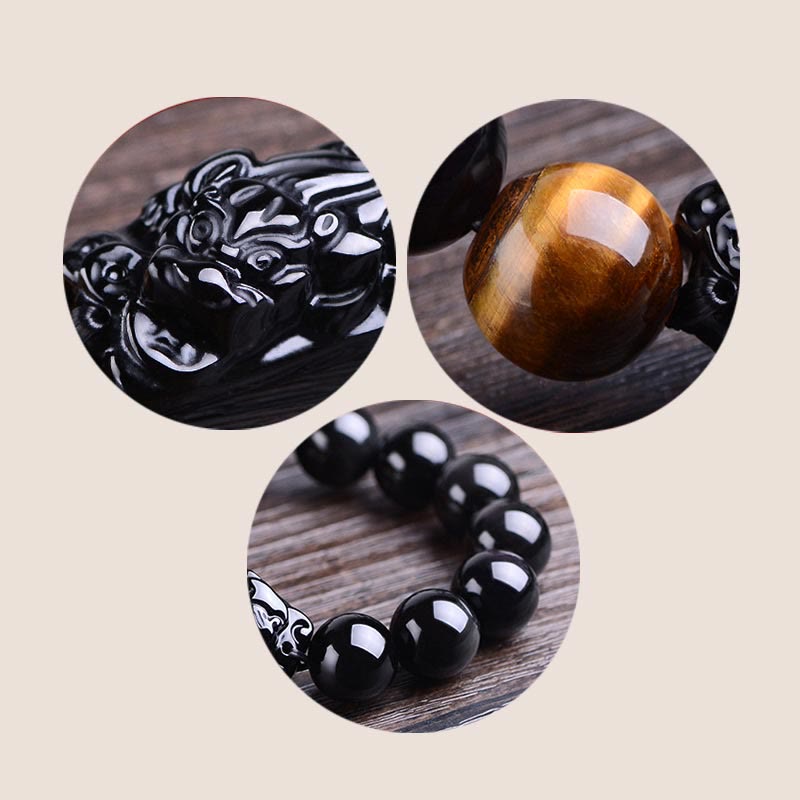 Black Obsidian PiXiu Tiger Eye Bracelet worn on wrist with teaware props, carved beast, lifestyle shot, zen