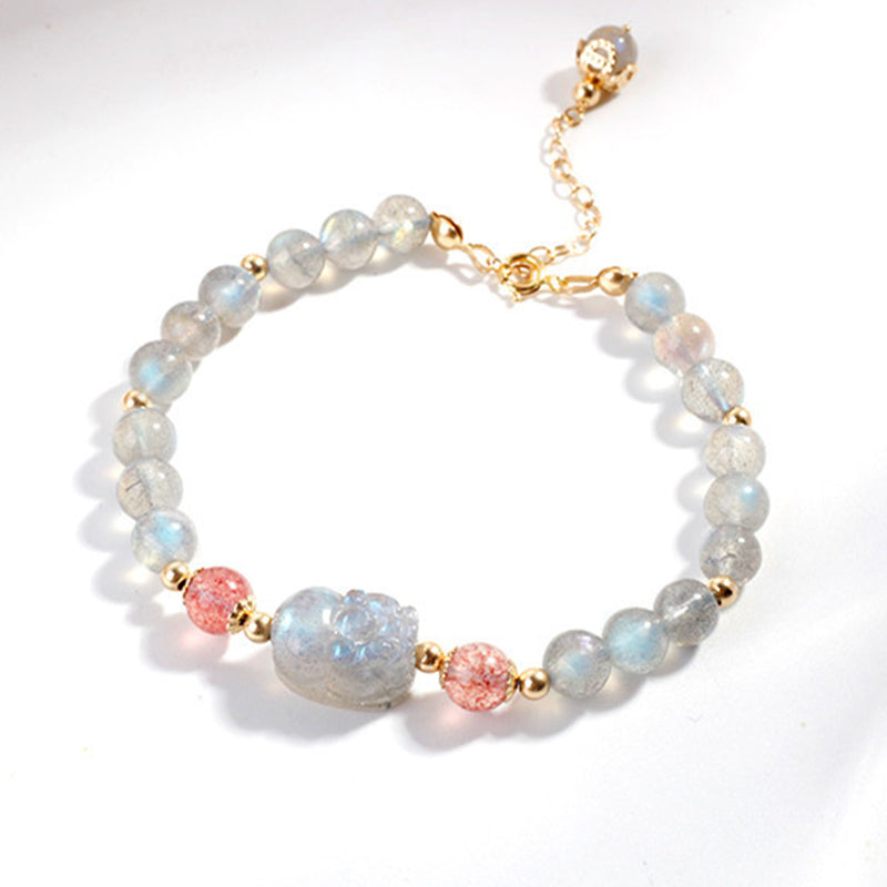 Moonstone PiXiu Bracelet – Full circle flat lay with gold chain on white, adjustable love bracelet