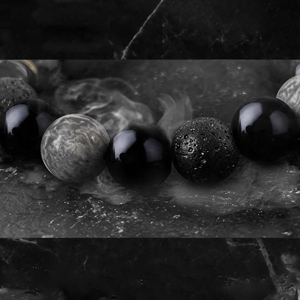 Black Obsidian Lava Rock Yin Yang Bracelet – Close-up glossy obsidian and porous lava beads, dark luxury crystal bracelet ...