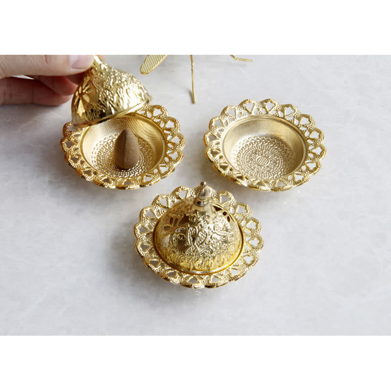 Tibetan Gold Mini Meditation Incense Burner – Disassembled gold lid with floral cut-outs, base with cone, interior texture