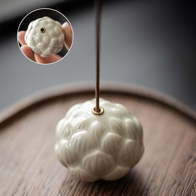 Ceramic Lotus Incense Burner with inset top view detail and brass holder, minimalist