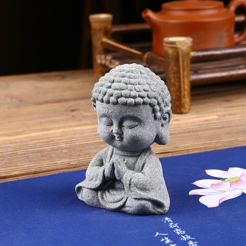 Meditation Praying Buddha Statue – warm sandstone color under sunset light, ambient home accent