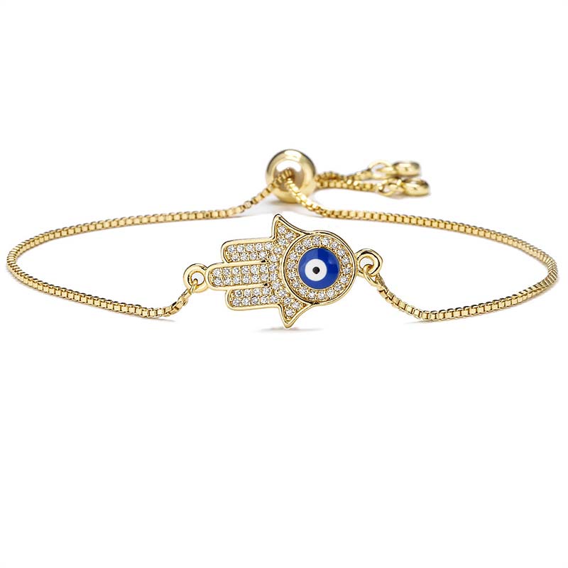 Gold Hamsa Hand Evil Eye Bracelet on White Background, Adjustable Protection Jewelry
