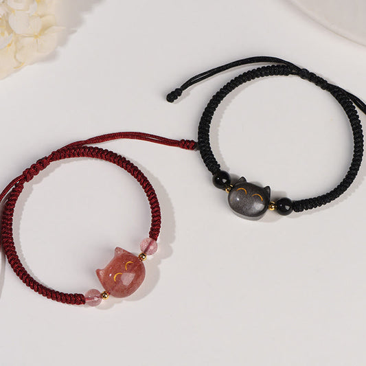 Matching couple cat bracelets with carved pink strawberry quartz and black obsidian cat heads, adjustable macrame cord friendship jewelry set