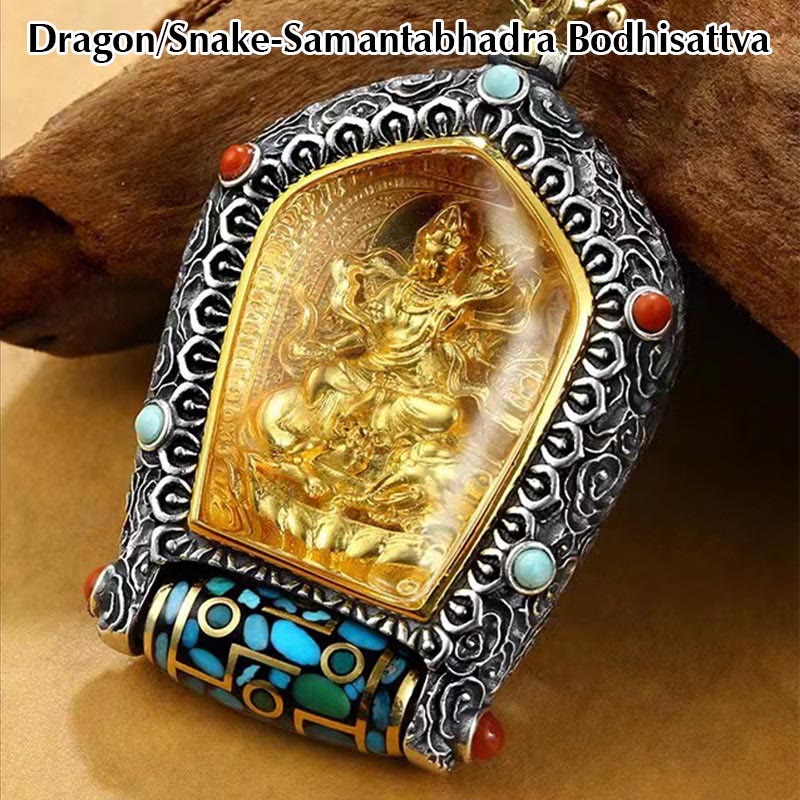 Tibetan Zodiac Buddha Dzi Bead Necklace – Gold Manjushri pendant in ornate silver frame with turquoise coral worn on braided chain under gray blazer, lifestyle chest shot