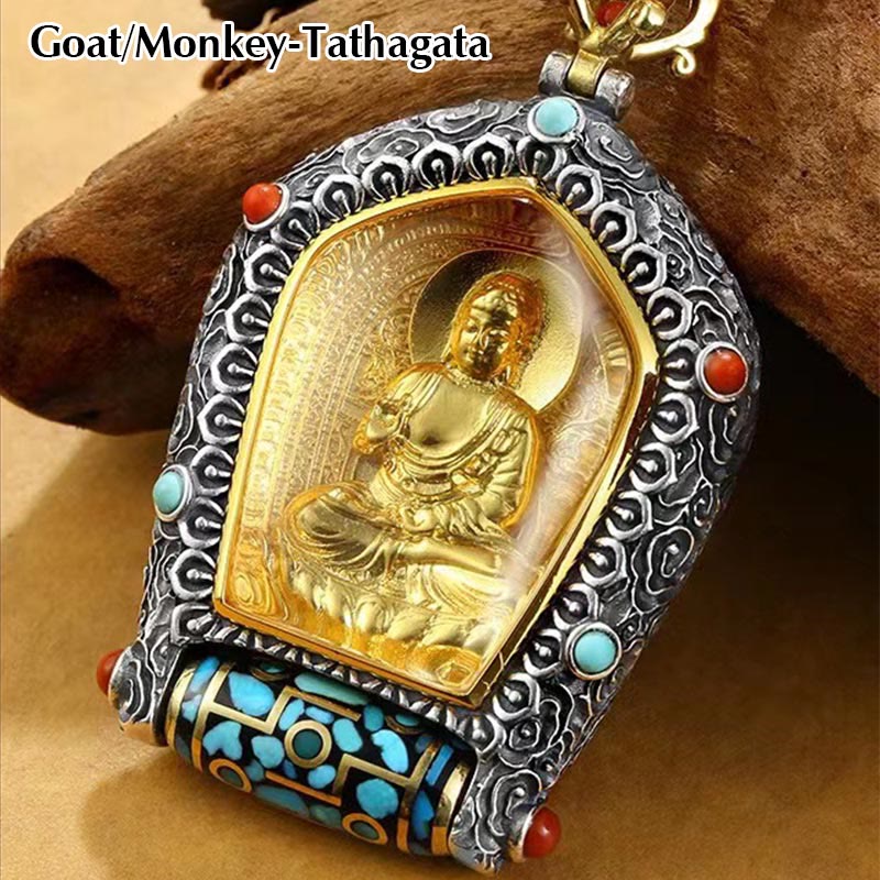 Tibetan Zodiac Buddha Dzi Bead Necklace – Gold Acalanatha deity in ornate silver frame with turquoise coral stones and prayer wheel, brown wood bark textured background