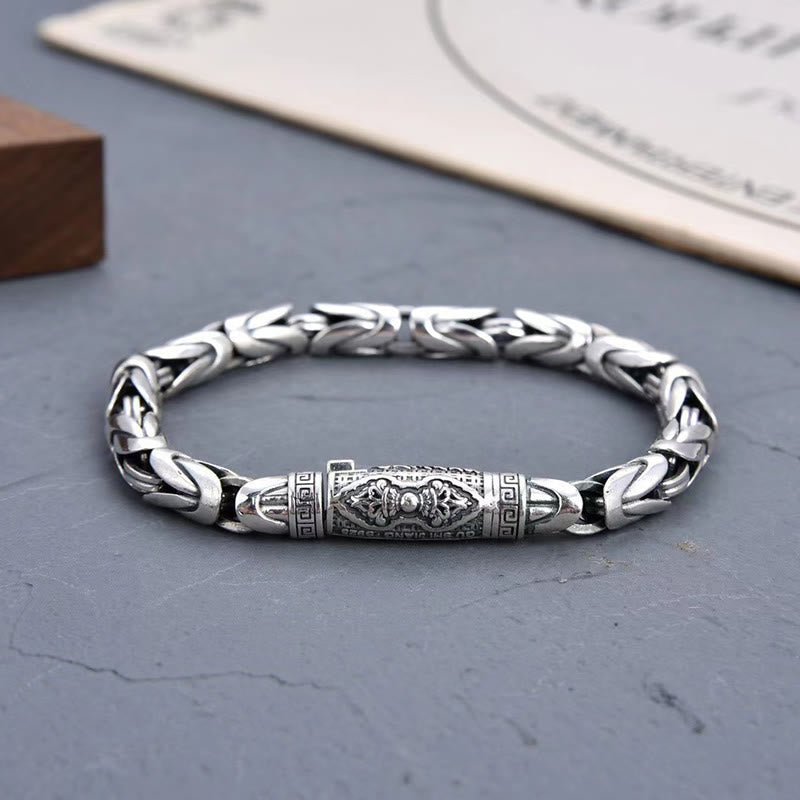 Dorje Vajra motif chain bracelet worn on wrist