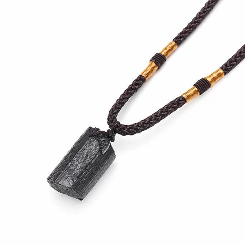 Obsidian Energy Balancing Necklace – Polished black tourmaline crystal pendant close-up showing glossy surface and natural texture, white background