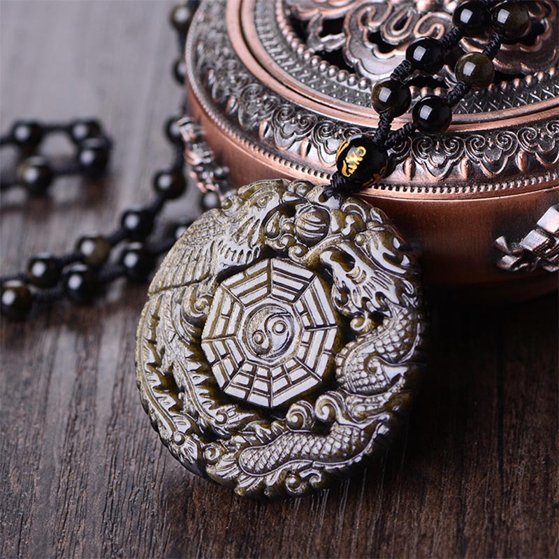 Golden Obsidian Pendant Necklace – Dragon Phoenix Bagua carving close-up, golden sheen obsidian