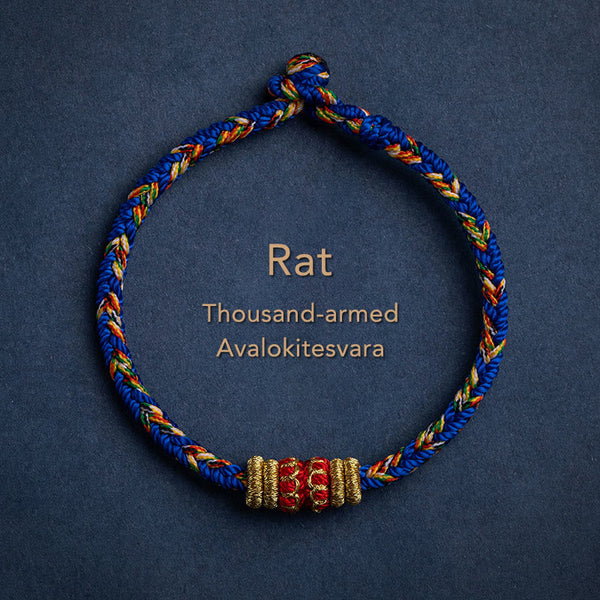 Blue braided cord bracelet for Rat zodiac with Thousand-armed Avalokitesvara blessing bead, gold and red Buddhist charm, adjustable Chinese knot jewelry