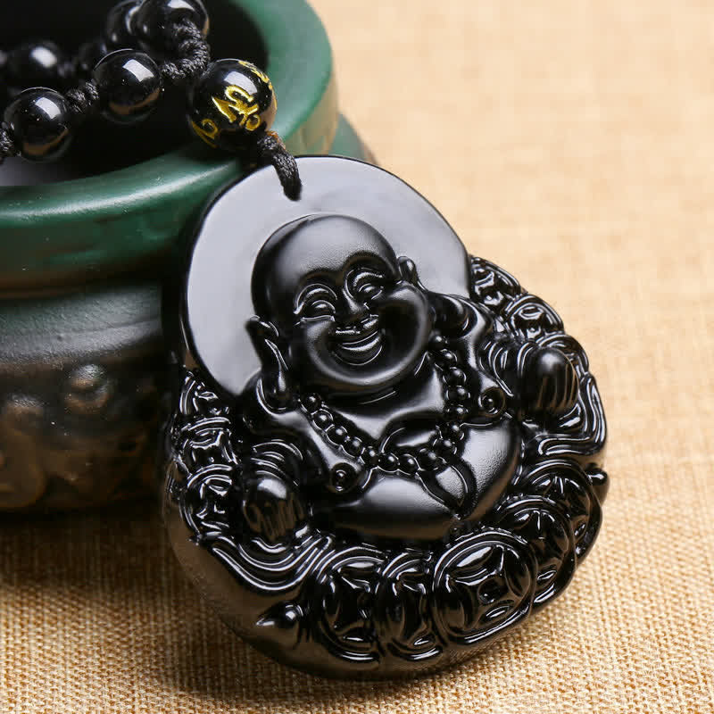 Black Obsidian Laughing Buddha Pendant Necklace – obsidian Laughing Buddha angled view, green ceramic – angled, detail
